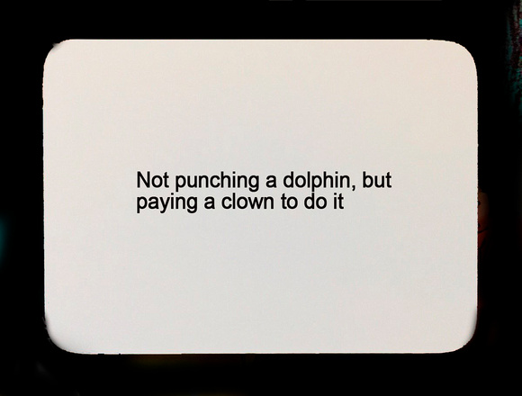 punching a dolphin oblique strategy card template FLT